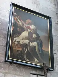 Photo du tableau « Saint Sébastien soigné par Irène et sa servante » au-dessus du confessionnal