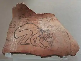 Une jeune fille attise le foyer. Ostracon de terre cuite. 20e dyn. Ägyptisches Museum Leipzig