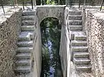 Les escaliers d'accès aux vannes de la grande écluse de Boizard à Pontgouin (2012).