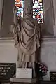 Statue de Saint-Clair dans l'église et ex-voto.