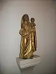 Statuette de la Vierge à l'Enfant en bois sculpté et doré datant du XVIIIe siècle