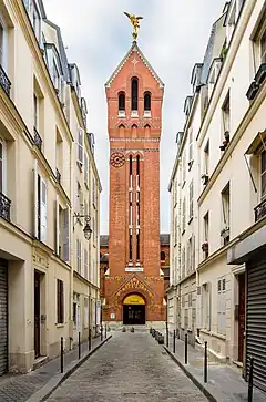 Clocher et entrée, vus depuis le passage Saint-Michel.