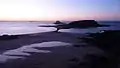 Vue des Petit et Grand Bés depuis les remparts de Saint-Malo, au coucher du soleil.