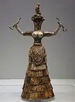 Une des figurines minoennes de la déesse aux serpent, vers 1600 av. J.-C.