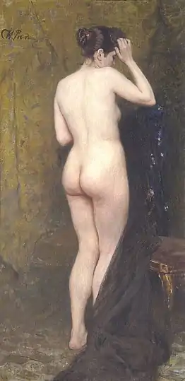 Femme nue debout de dos.
