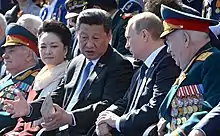 Le président chinois Xi Jinping et son épouse avec le président russe Vladimir Poutine