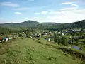 Vue du village de Tchoulech avec son paysage typique de la Chorie montagneuse.