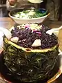 Riz gluant noir à l'ananas (菠萝黑糯米饭, bōluó hēinuòmǐfàn).