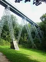 La passerelle de l'ancienne voie ferrée vue du Bois de la Brasserie