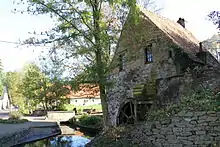 Ensemble formé par le château de Beauregard, le parc et le centre touristique constitué par l'église, la drève de tilleuls qui y conduit, le vieux moulin à eau, les étangs et les terrains environnants, à Froyennes