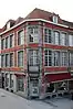 Les façades, les charpentes et les toitures de l'immeuble sis rue des Puits-l'Eau, n°11, à l'angle de la rue de la Triperie
