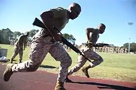 USMC from HQ and Svc Bon participate in a relay race 2010