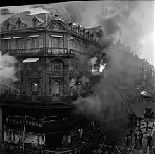 Photographie de l'incendie d'un magasin