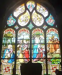 Vitrail représentant deux épisodes de la vie de sainte Nonne et de son fils saint Divy, 1903, église de Dirinon
