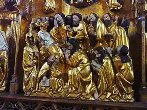 Le Retable de la Vierge, partie centrale du registre inférieur, la Dormition (La Vierge vient de mourir entourée des apôtres).