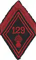 Insigne du losange de bras de 1er classe du 129e régiment d'infanterie.