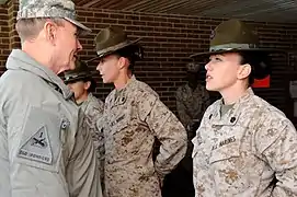 U.S. Army Gen. Martin E. Dempsey the chairman of the Joint Chiefs of Staff, talks with USMC Staff Sgt. Melissa Johnson, a drill instructor 2013
