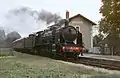 La 141 C 100 en gare de Champigny-sur-Veude le 28/08/1983.