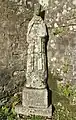 Leuhan : statue de saint Diboan située à l'extérieur de la chapelle Saint-Diboan.