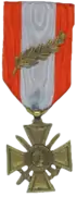 Croix de guerre des TOE avec une palme de bronze.