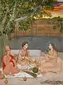 La dame assise sur une peau de lion skin, porte une large boucle d'oreille de la secte Kanphata (Nath yogi).