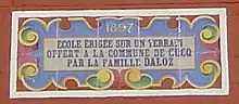 photo de la plaque commémorative sur l'école.