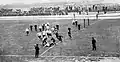 1903 (janvier) - Match RCF (en clair) - Toulouse (en sombre), sous la pluie.