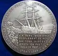 L'Endeavour au revers de la médaille d'argent commémorative de James Berry du jubilé des 200 ans de la redécouverte de la Nouvelle-Zélande en 1769.