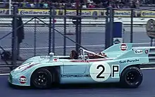 Joseph Siffert, sans casque, sur Porsche 908/3 en 1971 sur le Nürburgring