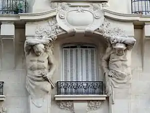 Atlantes, 1911, façade du 199-201, rue de Charenton à Paris.