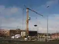 Une grue à tour à montage rapide (Potain GTMR 386) sur un chantier.