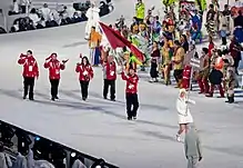 Photographie de l'entrée de la délégation albanaise lors de la cérémonie d'ouverture.