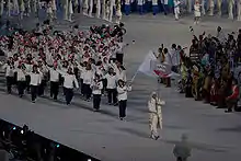 Photographie de l'entrée de la délégation japonaise lors de la cérémonie d'ouverture.