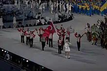 Photographie de l'entrée de la délégation turque lors de la cérémonie d'ouverture.