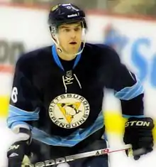 Photographie de Lovejoy avec le maillot bleu des Penguins en 2011