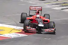 Photo de Timo Glock dans sa monoplace à Monaco.