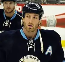 Photographie d'Orpik avec les Penguins de Pittsburgh