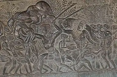 Scène de combats. Ennemis, héros, éléphants. Temple d'Angkor Vat.Première moitié du XIIe s.