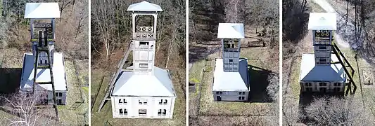 Quatre vues aériennes d'un bâtiment carré surmonté d'une tour en béton équipée de deux bigues de contrefort.