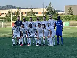 Ain Sud avec son entraîneur avant le match amical contre le Sporting Nord Isère le 11 août 2021.