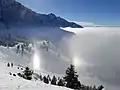 Parhélie sur une mer de nuages.