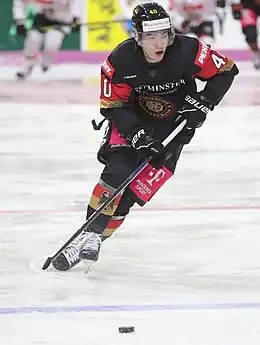 Photographie couleur d'un joueur de hockey sur glace