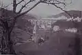 Train passant sur le viaduc ferroviaire de Port-Launay au début du XXe siècle