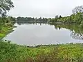 L'étang de Marcillé-Robert vu en direction de l'Ouest depuis le pont le franchissant situé entre les Bas Gats et le Rachat.