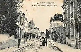 Carte postale représentant la rue Carnot depuis le carrefour Carnot — aujourd'hui place Milosz —, au tournant du XXe siècle