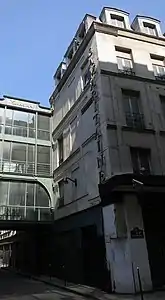 Le magasin 4 à l'angle de la rue de la Monnaie et de la rue Baillet (immeuble de la fin du XVIIe siècle surélevé au XVIIIe siècle).