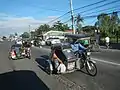 À Lubao, comme dans d'autres régions des Philippines, les taxi side-cars sont un moyen populaire de se déplacer (2017)