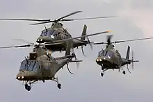 Trois Agusta 109 volant en formation.