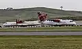 Un ATR 42 aux côtés d'un ATR 72 de Loganair