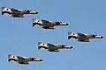 Formation en V de F-4 Phantom de la Force aérienne de la République islamique d'Iran.